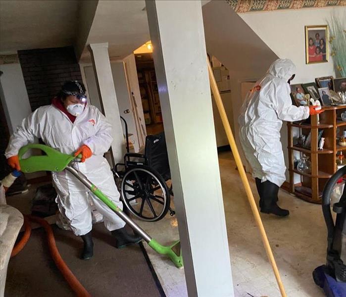 SERVPRO TEAM in PPE cleaning
